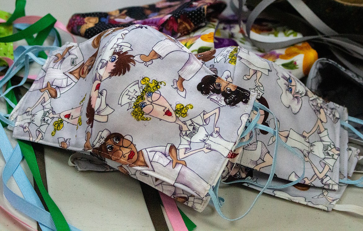 Look for the helpers Ephrata fabric shop coowner, quilters working to